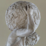 A marble sculpture of Atlas carrying the globe of the heavens, the constellation Aries (the Ram) can be seen towards the left, across three narrow parallel lines that mark the path of the Sun.