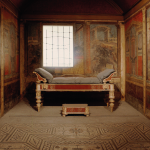 A reconstructed interior of a Roman bedroom, decorated with wall paintings